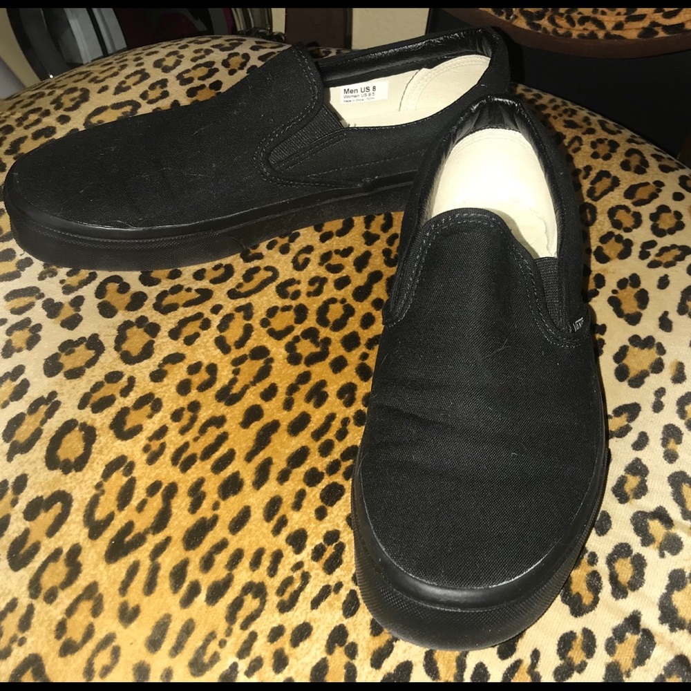 Black Vans slips ons